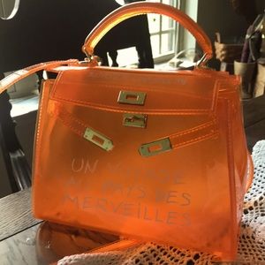 Plastic orange crossbody or handle purse